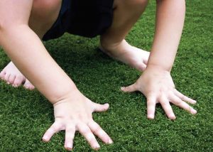 Child on Synthetic artificial lawn